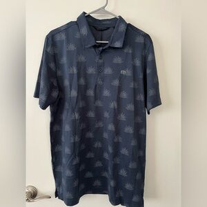 Travis Mathew Blue Polo Shirt with Geometric Pattern